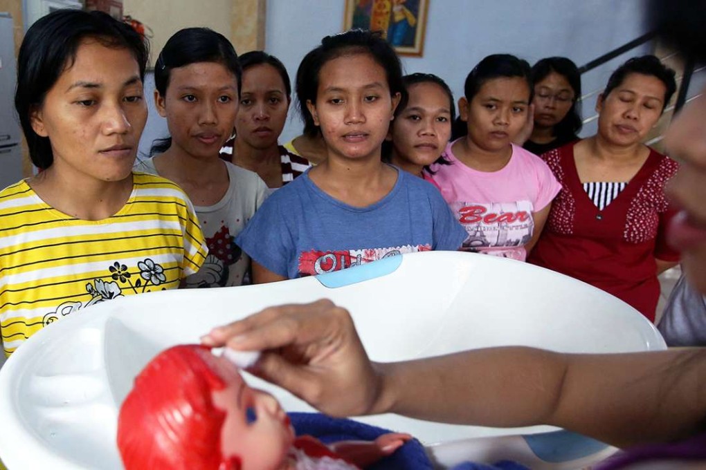 Indonesian domestic helpers at the PT. Bandar Laguna training centre in Indonesia. Photo: Sam Tsang