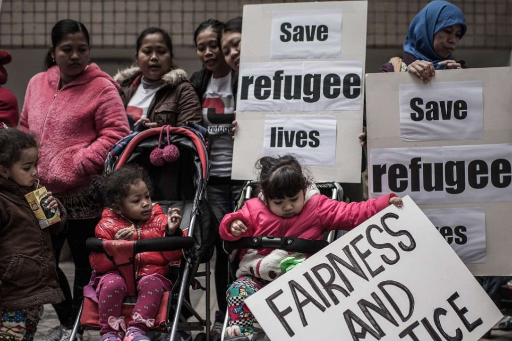 Asylum seekers and their children protesting for their rights in Hong Kong. Photo: AFP