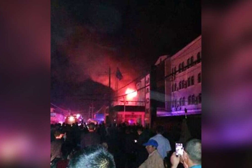 Flames coming from the factory building in Zhejiang province. Photo: SCMP Pictures