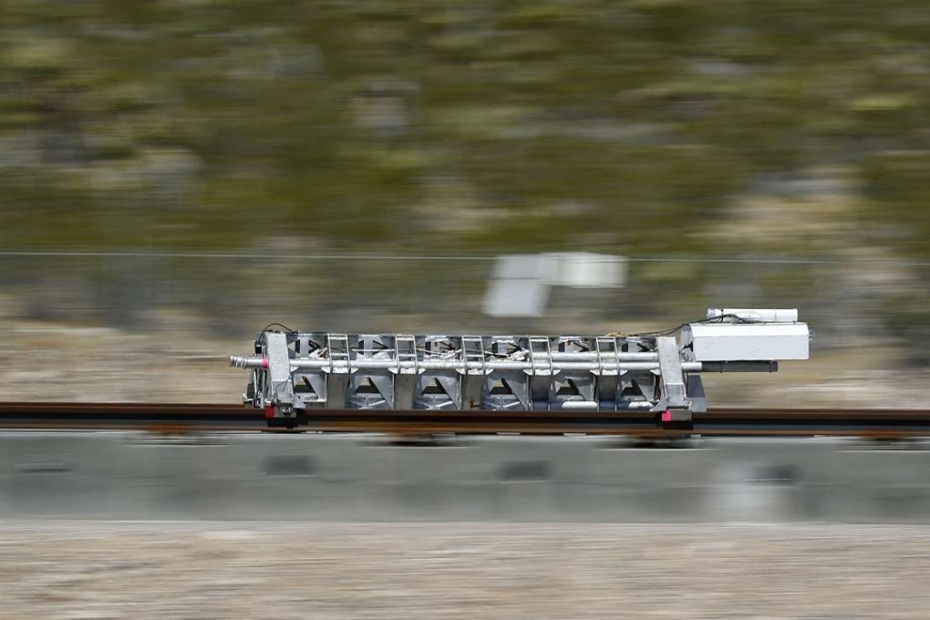 A sled speeds down a track during a test of the Hyperloop One propulsion system on Wednesday in North Las Vegas, Nevada. Photo: AP