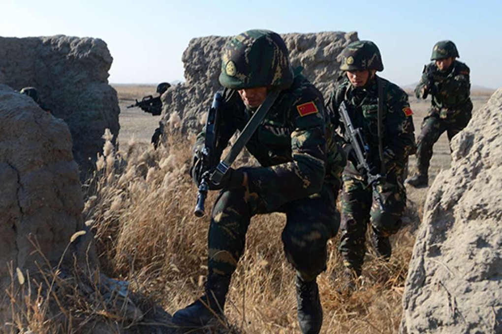 PLA troops take part in a live-fire drill in northeast China. The CMC has dispatched teams to assess training standards. Photo: SCMP Pictures
