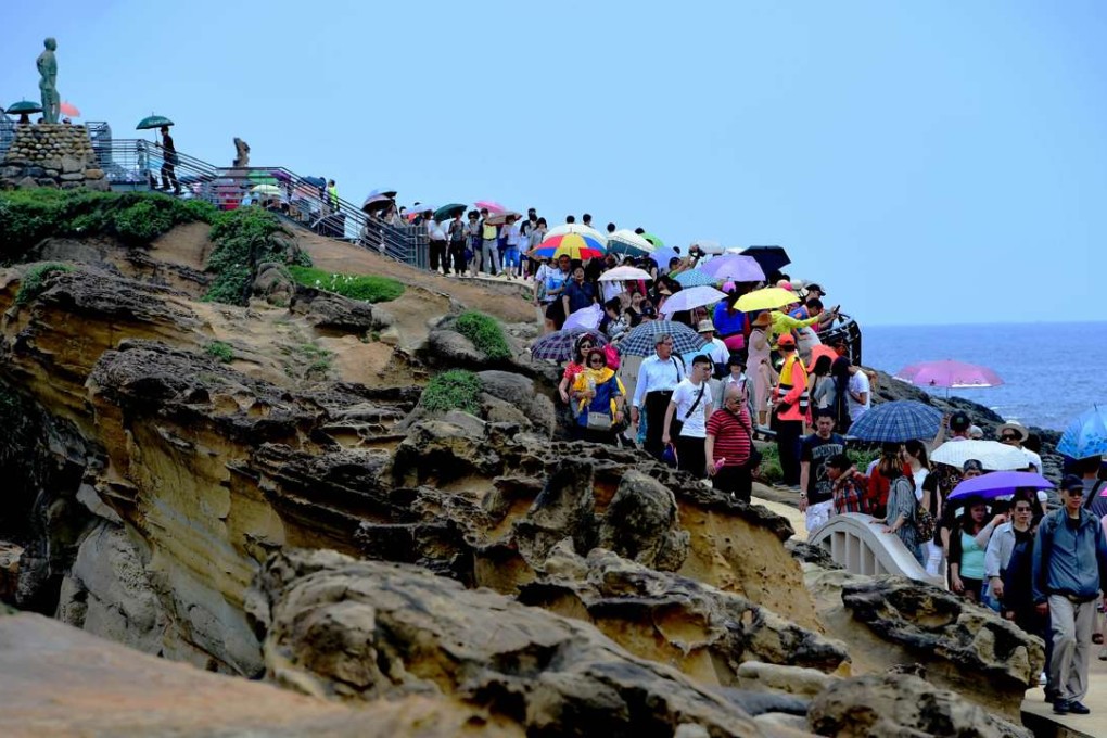 Tourists visit Yehliu Geopark in New Taipei, Taiwan. Photo: Xinhua