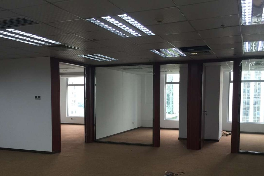 Landlords fail to find tenants to fill office spaces in Futian, the CBD of Shenzhen, as an increasing number of P2P companies close down. Photo: SCMP Pictures