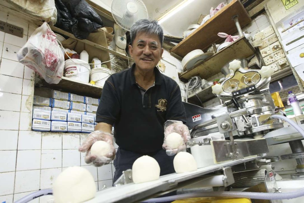 Kwok Kam-chuen, owner of Kowk Kam Kee, making buns ahead of the Cheung Chau Bun Festival. Photo: David Wong
