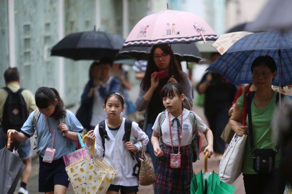 School suspensions due to heavy rain to be synced to Hong Kong Observatory alerts in future | South China Morning Post
