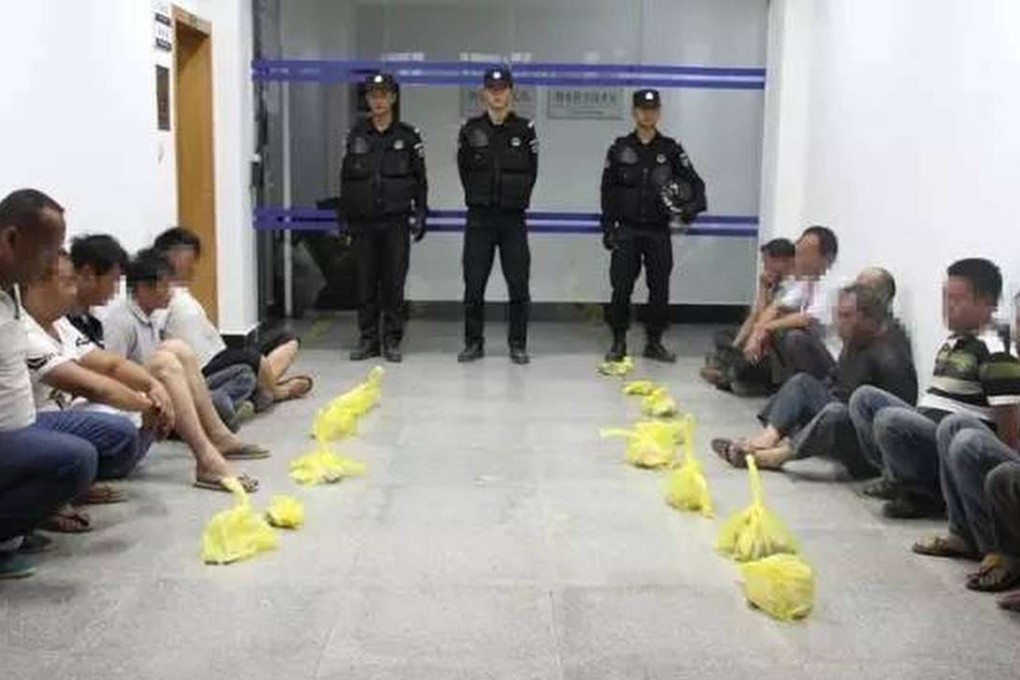 Longyang police detain suspects after government officials were held captive in a land dispute. Photo: SCMP Pictures