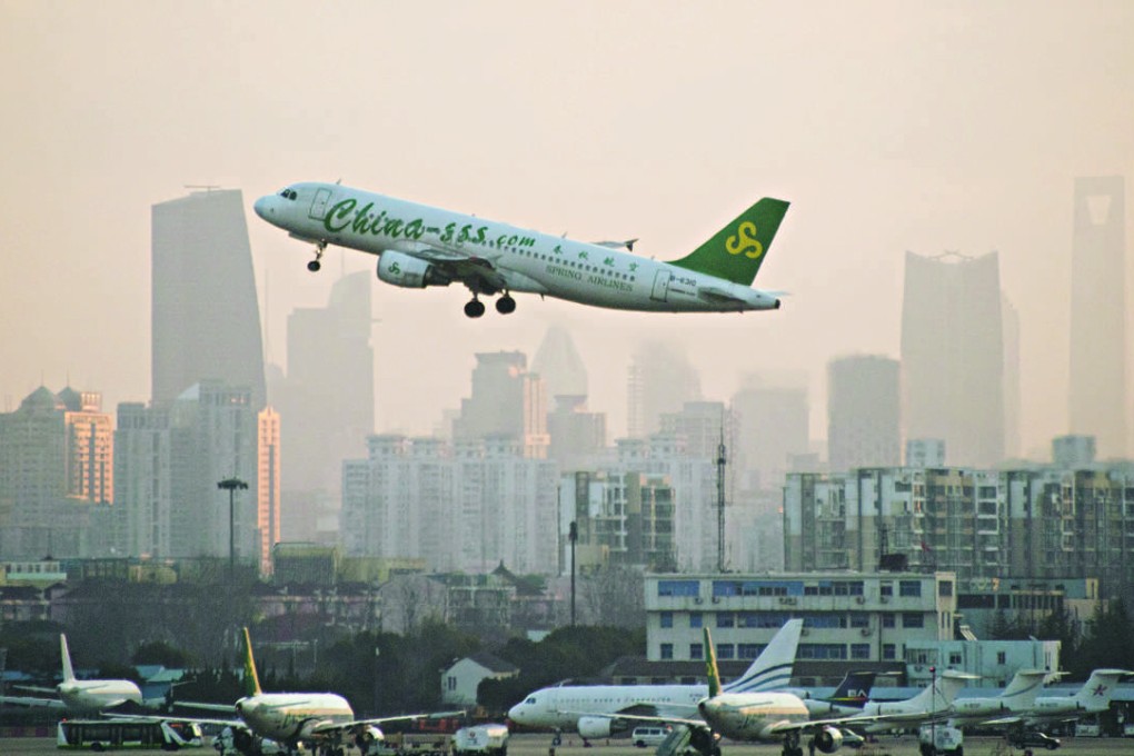 A plane from Chinese airline Spring Airlines departs from Hongqiaou Airport in Shanghai. Photo: AFP