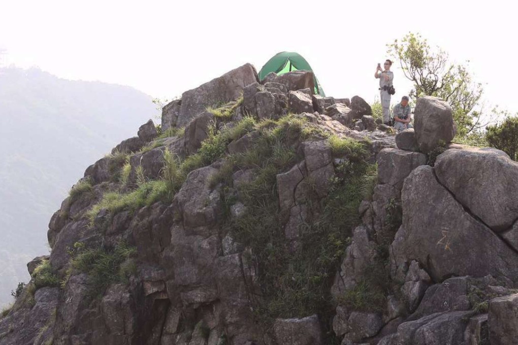 Police on standby atop Lion Rock. Photo: Dickson Lee.