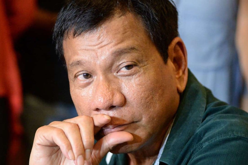 Philippine President-elect Rodrigo Duterte speaks during his first press conference since he claimed victory in the presidential election, at a restaurant in Davao City. Photo: AFP