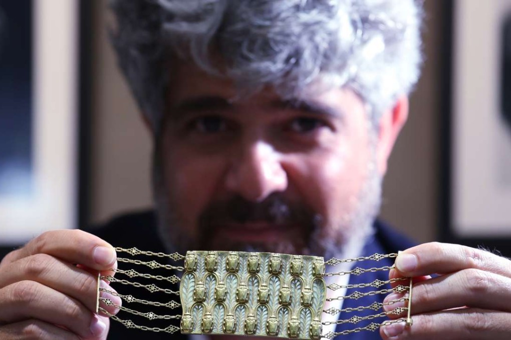 Gilles Zalulyan, owner of Palais Royal Paris in Central, displays a bracelet given as a gift from René Lalique to his daughter Suzanne, who then gave it as a wedding present to the last owner’s mother. Photos: Nora Tam