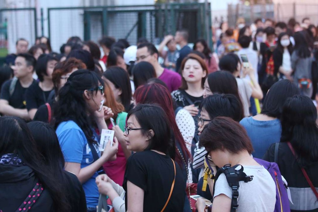 Fans waiting for the Leon Lai concert at the Central Harbourfront. Photo: David Wong
