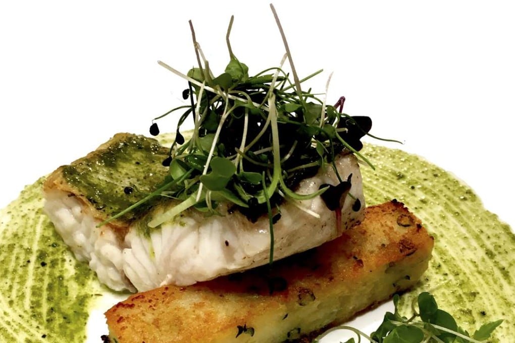 Hake supreme with pesto and potato at QMO in Ship Street, Wan Chai.