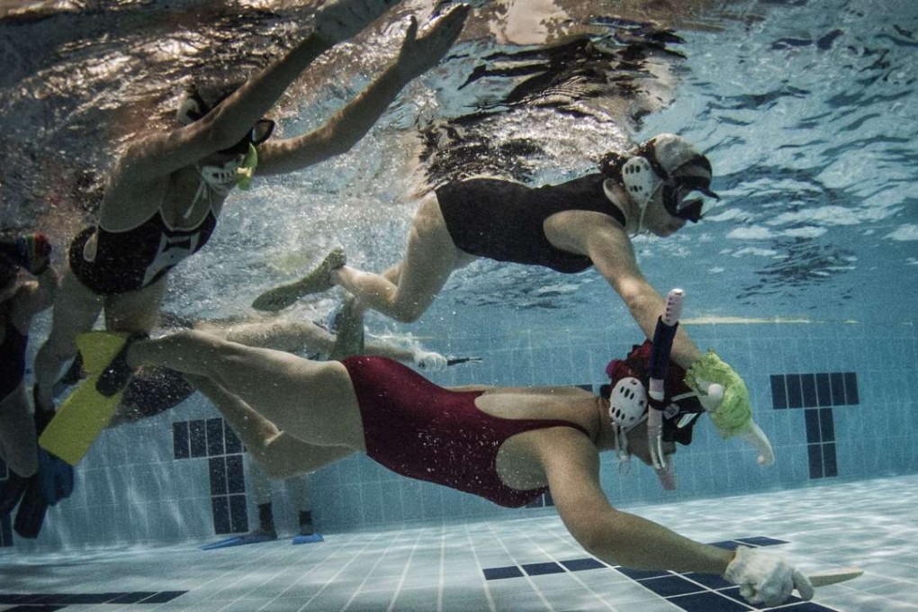 The Hong Kong underwater hockey team includes top-level players from France, the Philippines, New Zealand and Britain. Photo: Kevin Wang