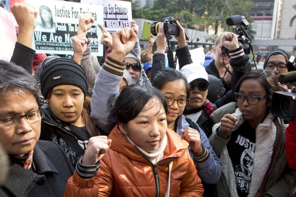 Indonesian maid Erwiana Sulistyaningsih (front, centre) arrives to testify in the court case against her Hong Kong employer, who was jailed for six years. Photo: AP