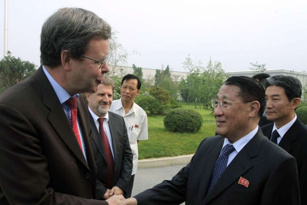 North Korea's Kang Sok-ju (right), with German Ambassador to North Korea Thomas Schaefer. Photo: AP