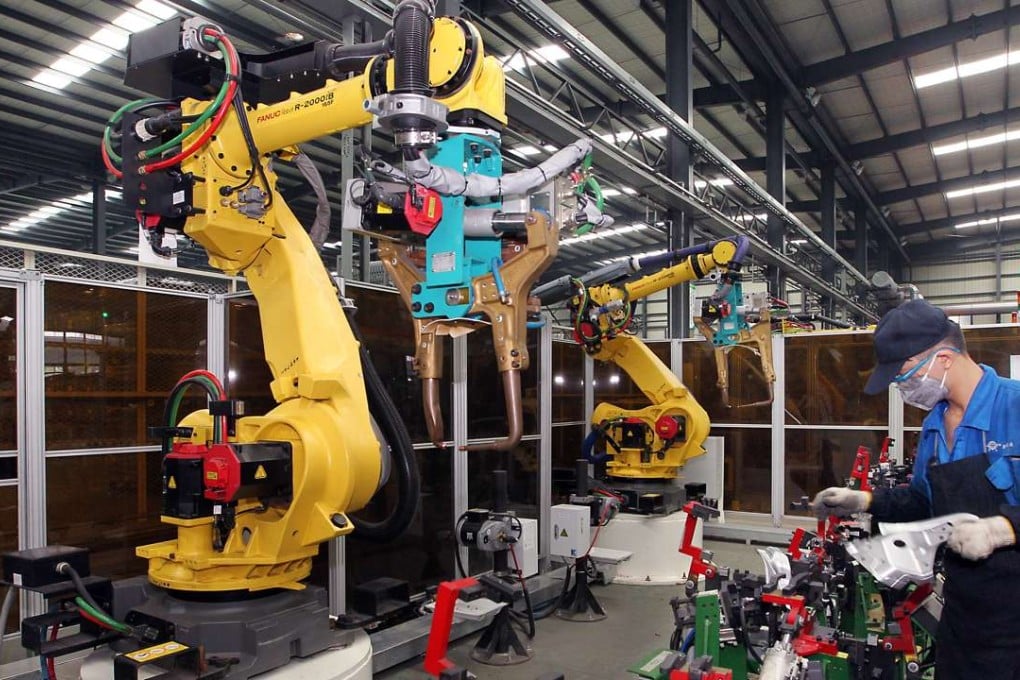 Industrial robots at work in Kunshan Daya Auto Parts Company. Photo: SCMP Pictures