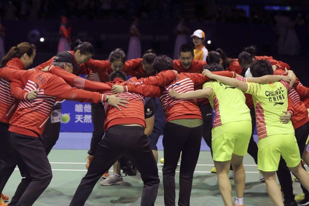 China's players and coaches celebrate after winning the Uber Cup in Kunshan. Photo: AP