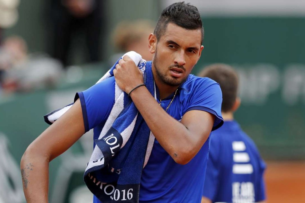 Australian Nick Kyrgios screamed at a ballboy over a towel and got a code violation during his match against Marco Cecchinato of Italy. Photo: Reuters