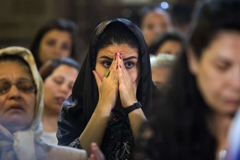 Coptic Christians attend prayers for the victims of EgyptAir flight 804 at Al-Boutrossiya Church, in the main Coptic Cathedral complex in Cairo, Egypt, on Sunday. Photo: AP