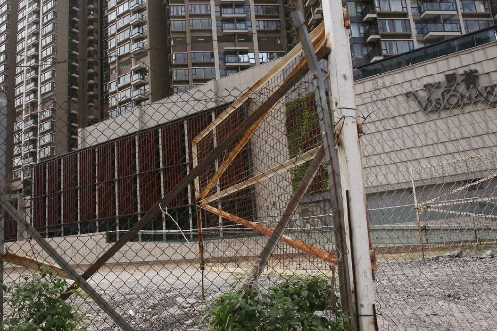 An empty patch of government land next to The Visionary in Tung Chung is believed to be the source of the problem. Photo: Sam Tsang
