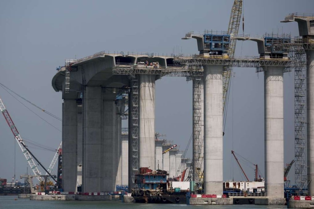 Construction work takes place on the Hong Kong Link Road, part of the Hong Kong-Zhuhai-Macau Bridge in Hong Kong on May 11 2016. Photo: EPA
