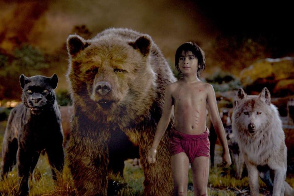 A still from John Favreau’s The Jungle Book, starring (from left) Bagheera, Baloo, Mowgli and Raksha.