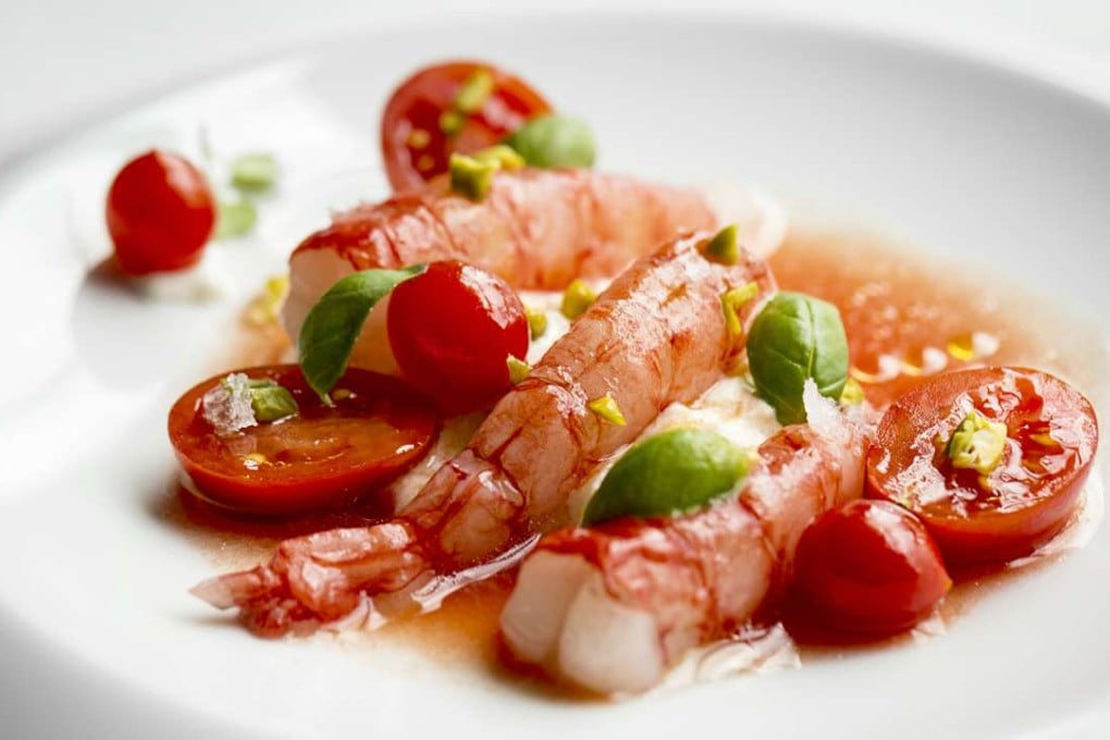 Creamy burrata with raw tomato juice and marinated raw Italian red prawns at The Drawing Room.