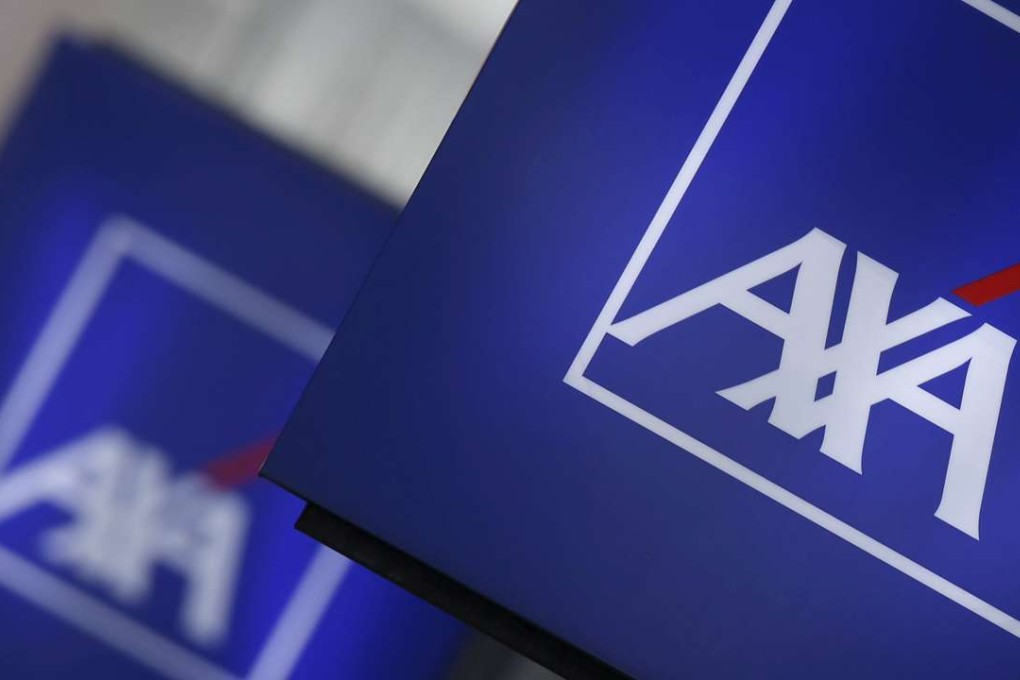 Logos of France's biggest insurer Axa are seen on a building in Nanterre, near Paris. The firm will start to divest itself of about US$2 billion worth of tobacco-related investments. Photo: Reuters