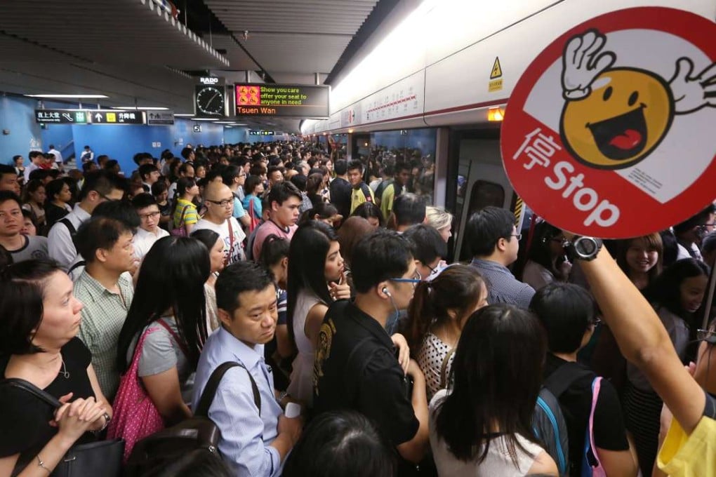 Passengers wait for a train at Admiralty MTR station. Photo: Sam Tsang
