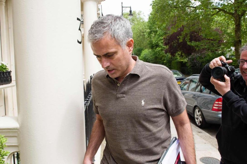 Portuguese football manager Jose Mourinho is pictured as he returns to his home in London. Photo: AFP