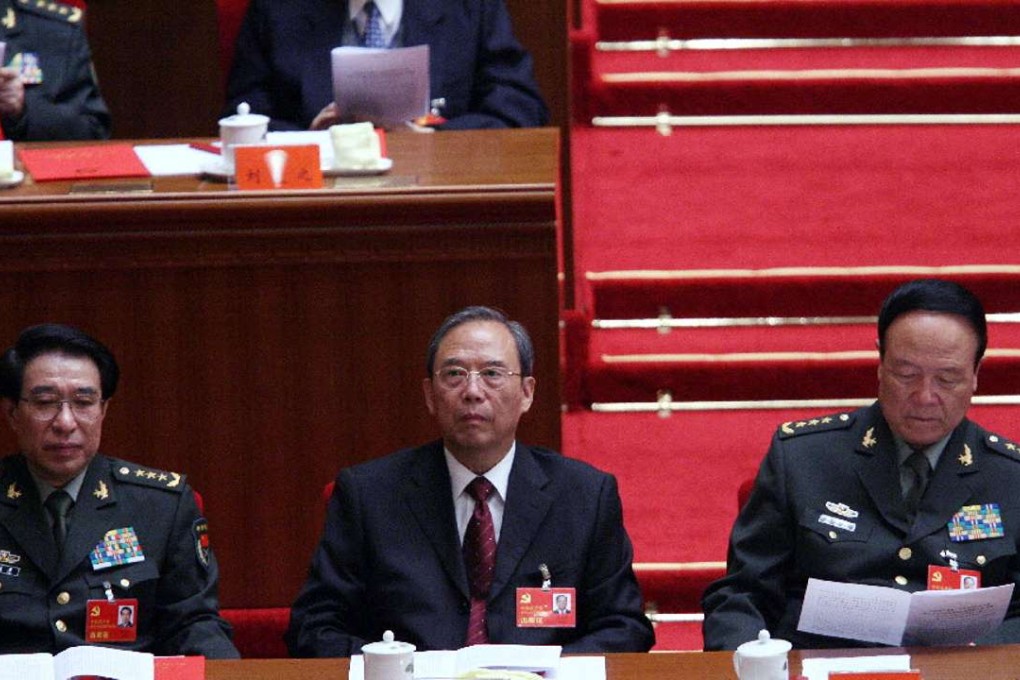 From left: Xu Caihou, Zeng Peiyan and Guo Boxiong during the closing ceremony of the 17th Party Congress at the Great Hall of the People in Beijing in 2007. Both Xu and Guo have since been snared in President Xi Jinping’s anti-graft campaign. File Photo