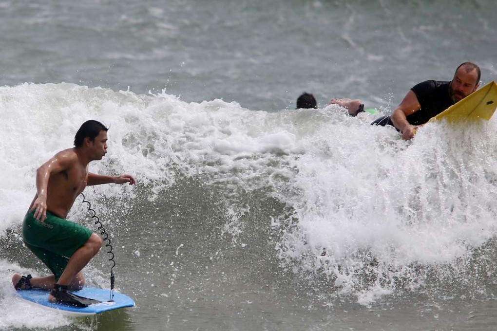 The Observatory is advising people not to do this with a typhoon approaching. Photo: SCMP Pictures