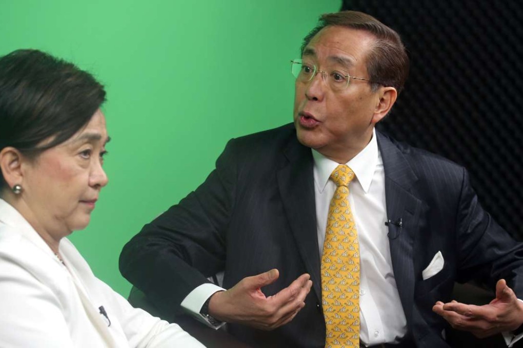 Arthur Li (right) said in an interview with lawmaker Emily Lau that it was the university which said it was OK to move the meeting back to the main campus. Photo: Nora Tam