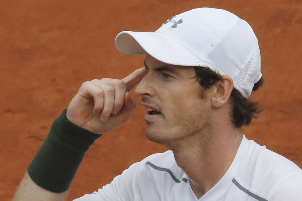 Andy Murray gives himself encouragement during his second straight five-set match at the French Open. Photo: Reuters