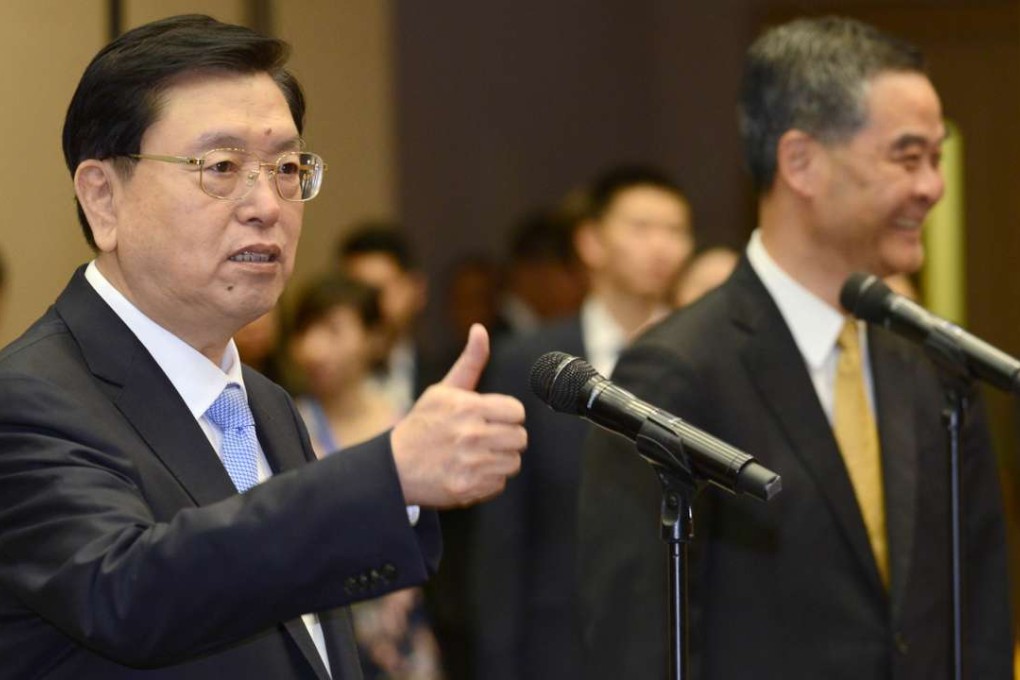 Zhang Dejiang (left) with Chief Executive Leung Chun-ying in Hong Kong. Photo: SCMP Pictures