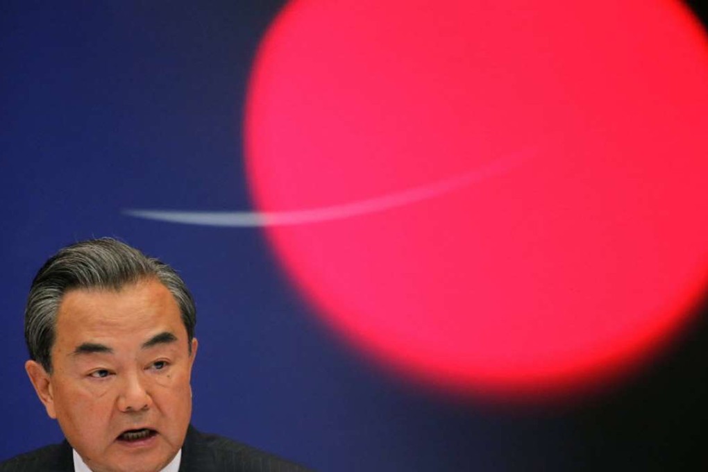 China’s Foreign Minister Wang Yi addresses reporters in Beijing. Photo: Reuters