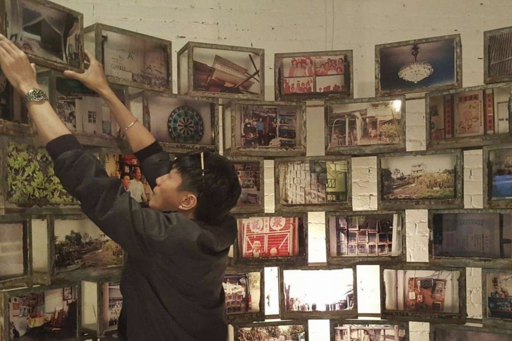 Curator Stanley Siu reconstructs Aden Chan Pui-hong’s exhibit.