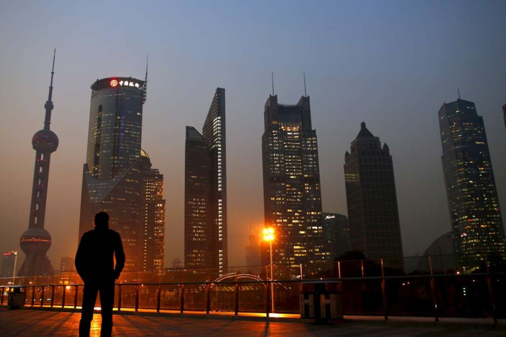 Shanghai’s Pudong financial district at dusk. The Chinese finance ministry’s statement on Friday comes amid concerns about China’s debt risks. Photo: Reuters