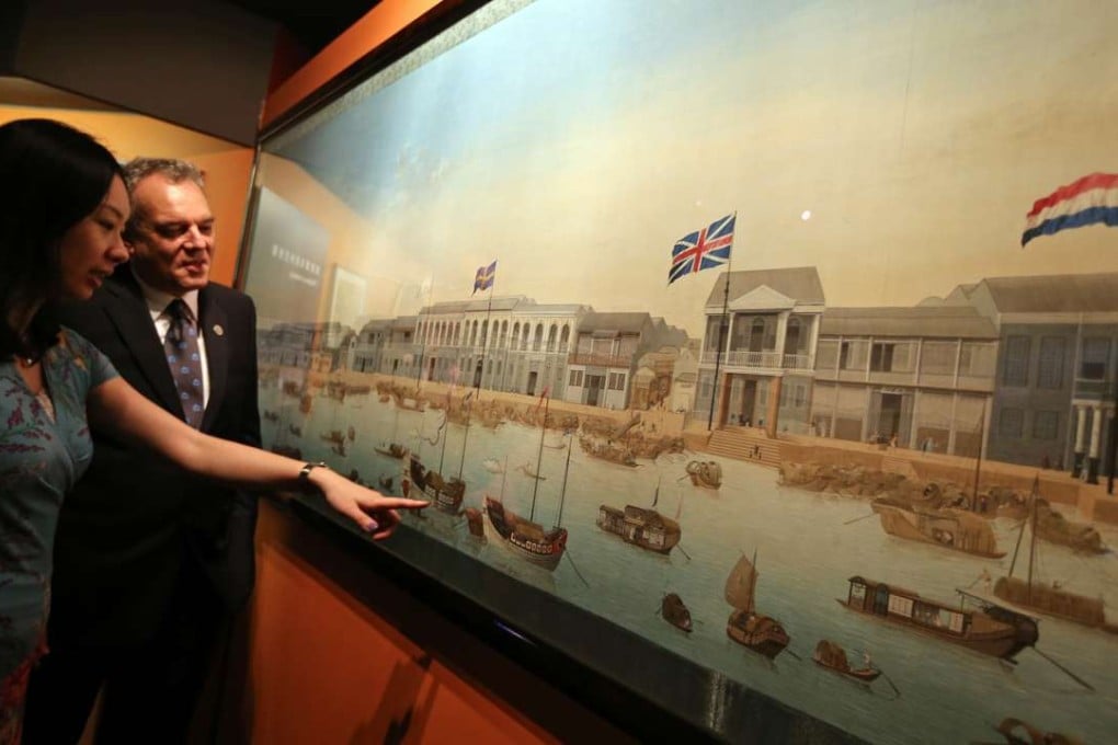 (L to R) Dr Libby Chan, senior curator and Richard Wesley, museum director talk in front of Alexander Hume's painting - 13 Hongs Foreign Factories at Hong Kong Maritime Museum in Central pier. 26MAY16 SCMP/Felix Wong