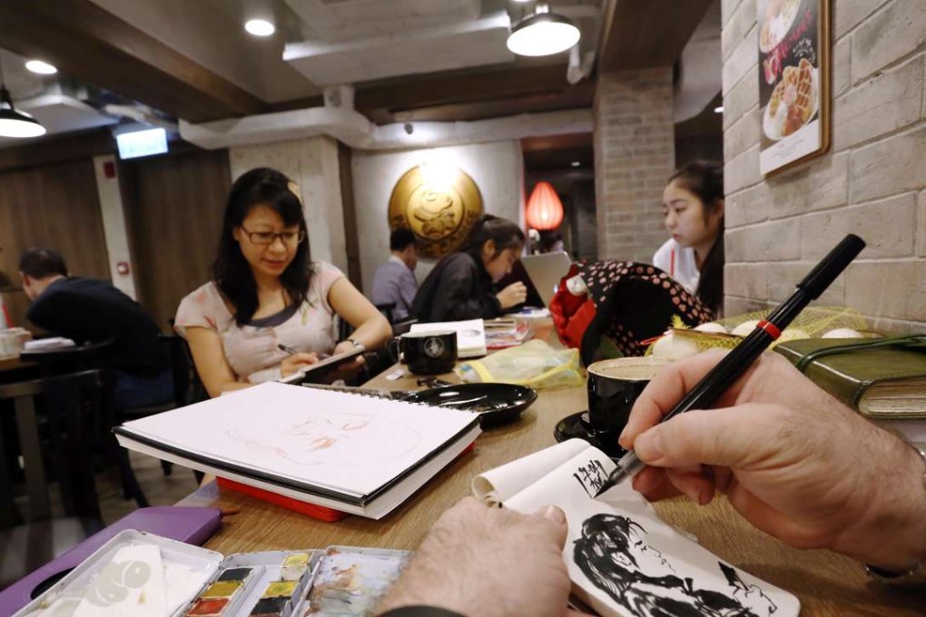 Participants in the group sketch meet-ups draw each other’s faces. Photos: Jonathan Wong