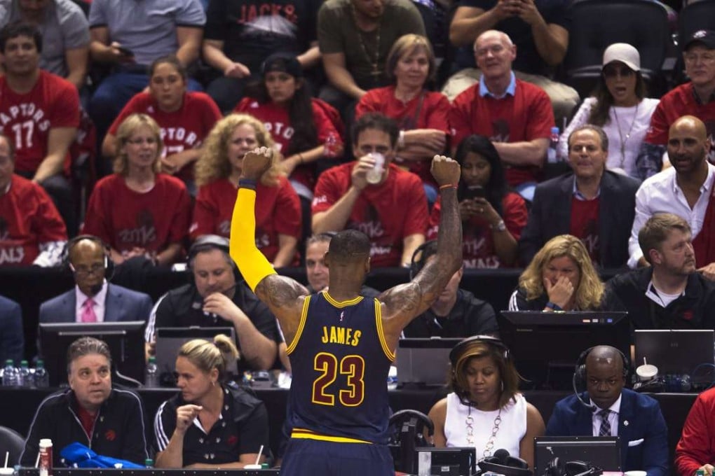 Cleveland Cavaliers forward LeBron James reacts to the crowd during game six against the Toronto Raptors. Photo: AP