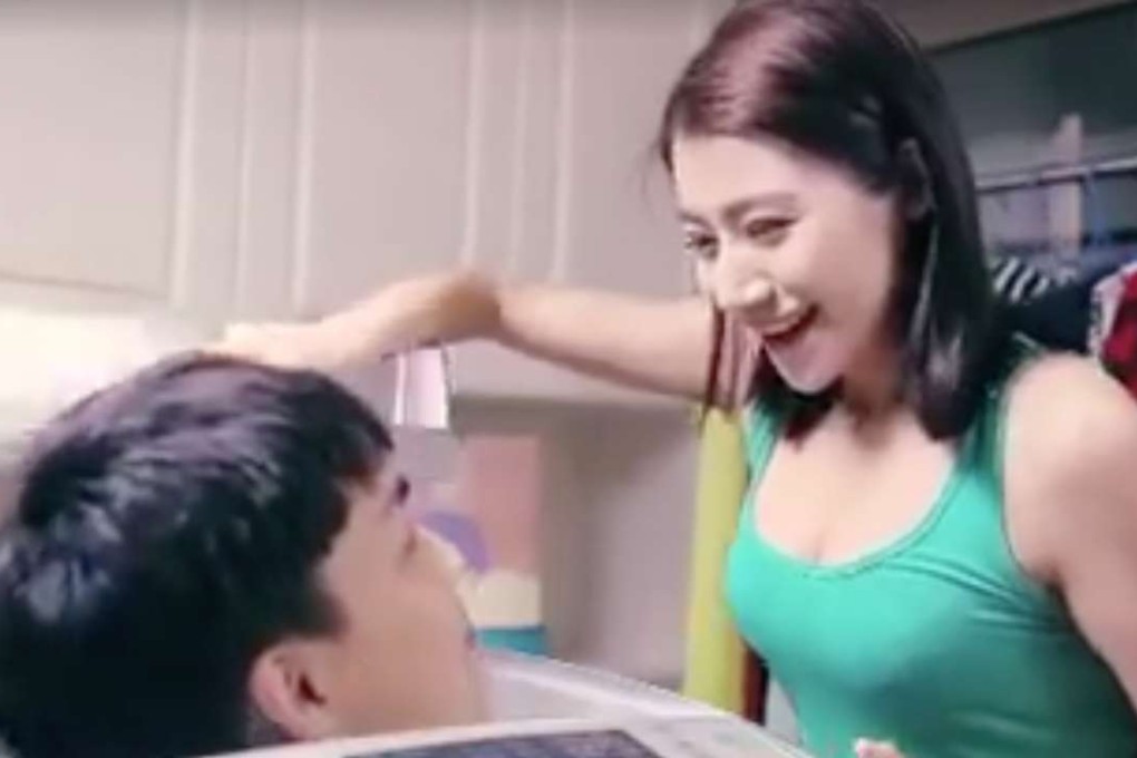 The commercial shows a Chinese woman “cleaning” a black man who then emerges from the machina as an Asian man. Photo: SCMP Pictures