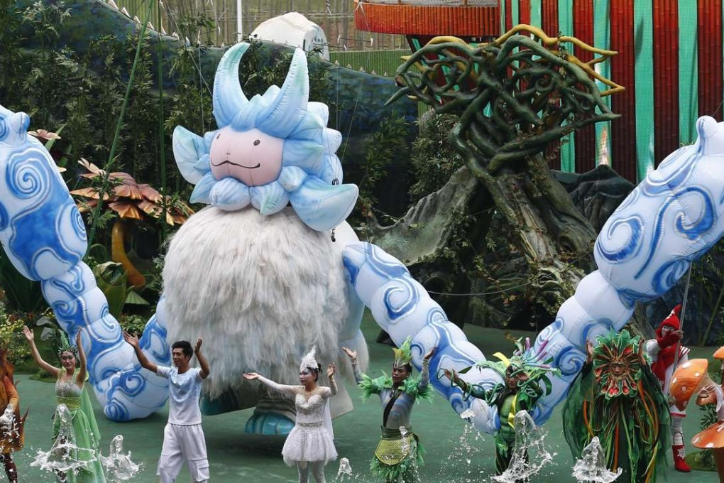 Performers of a fantasy play greet audience at the outdoor theme park of the newly-opened 'Wanda City'. Photo: EPA