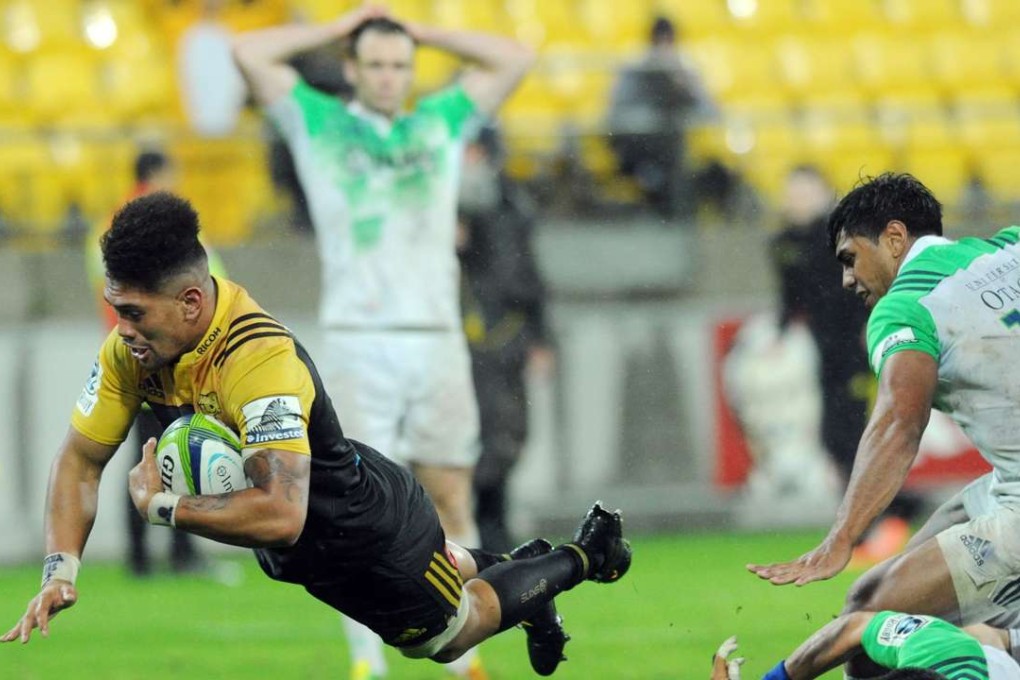 Ardie Savea of the Hurricanes dives in to score the match-winning try against the Highlanders in their Super Rugby clash in Wellington on Friday. Savea’s performances this season have propelled him into the All Blacks squad. Photo: EPA