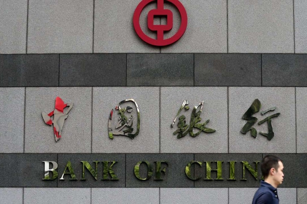A man walks past the Bank of China Central's Headquarters. Photo: K. Y. Cheng