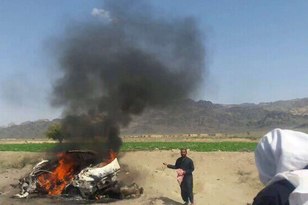 This photograph taken on May 21 shows the wreckage of the car that was being driven by Mohammed Azam, with Afghan Taliban leader Mullah Akhtar Mansour, around 160km west of Quetta, when it was destroyed by a US drone. Photo: AFP