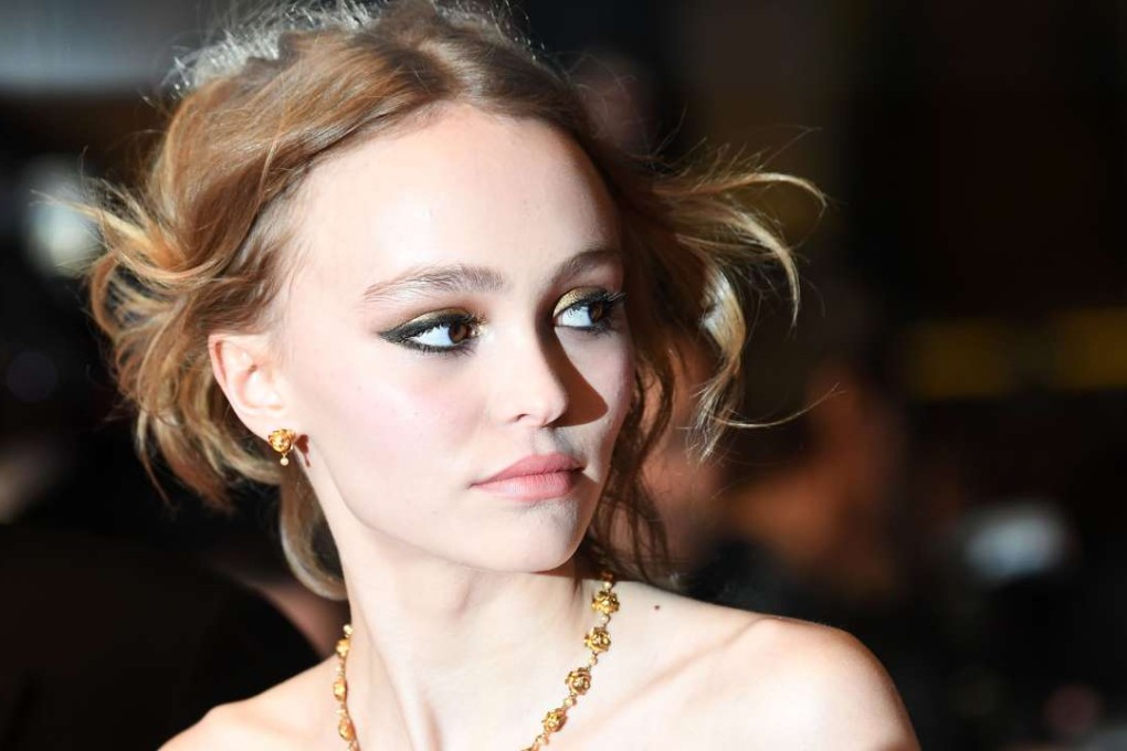 Lily-Rose Depp, pictured on May 13 at the 69th Cannes Film Festival, took to social media on Sunday to defend her father, after his wife, Amber Heard accused him of abuse and filed for divorce. Photo: AFP