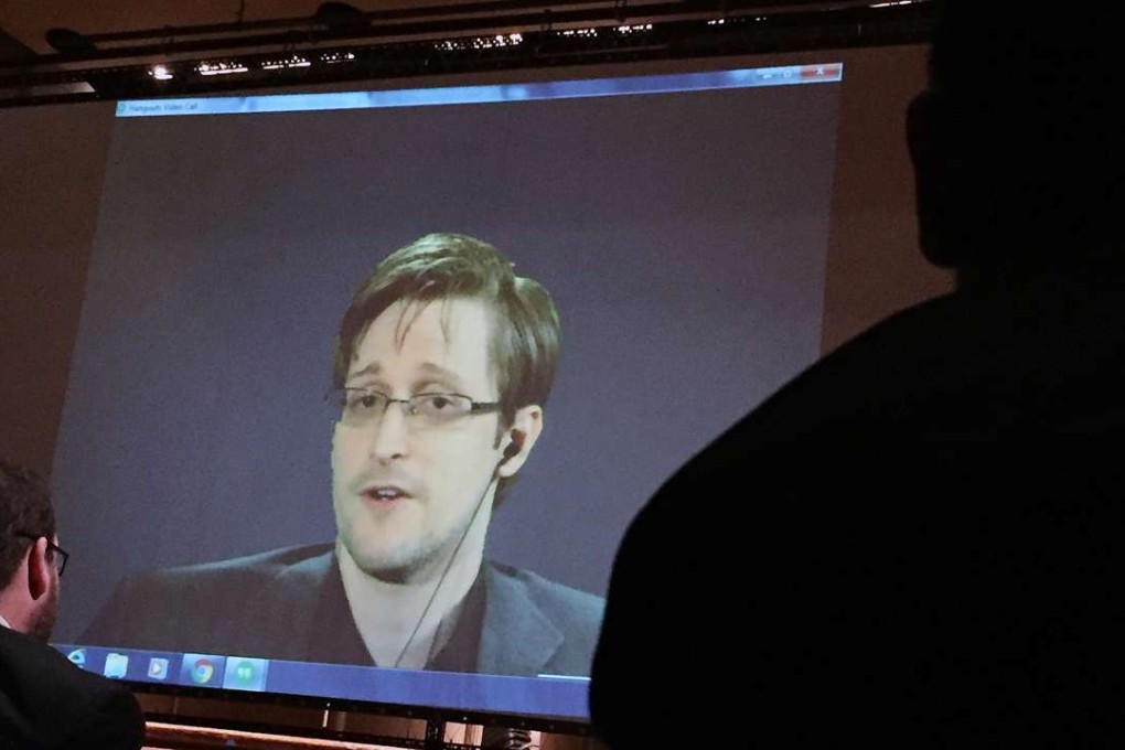 Former National Security Agency contractor Edward Snowden speaks via video conference at the Johns Hopkins University auditorium in Baltimore in February. Photo: AP