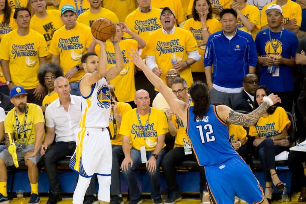 Golden State Warriors guard Stephen Curry shoots for a 3-point basket against Oklahoma City Thunder during their game seven win. Photo: USA Today