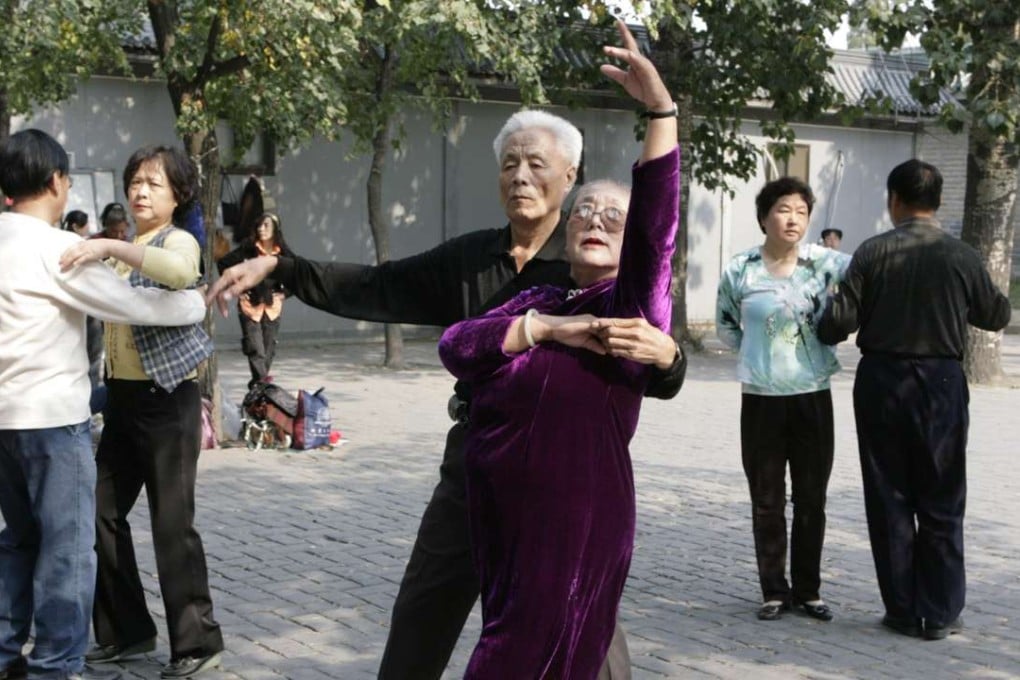 Elderly people dance during a morning exercise session at the Temple of Heaven park in Beijing. China’s greying population and low investment returns have spawned concern over whether it can keep up its pension payments in the long term. Photo: Reuters